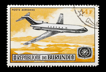 stamp printed in Burundi featuring a Boeing 727 jet airliner