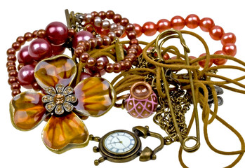 Abstract composition of vintage embelishments: string of beads,