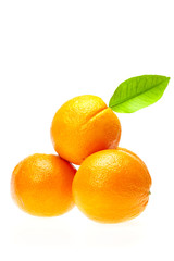 oranges with leaves isolated on white