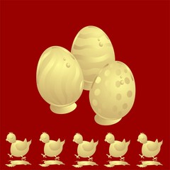 złote pisanki na czerwonym tle © Lasa
