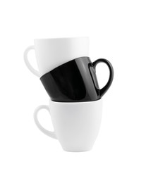 Black and white cups in stack isolated