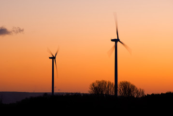 Wind generators at dusk