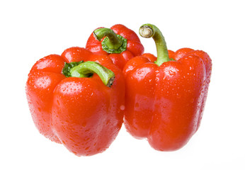 red juicy peppers on white background