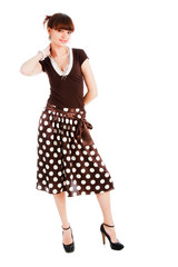 Young  sensuality beautiful girl in spotted skirt