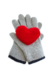 Heart lies on gloves