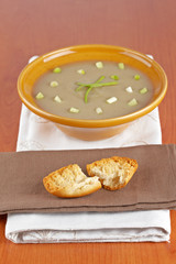 Cream of mushroom soup and bread croutons