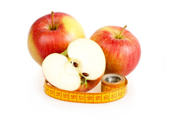 Dieting concept with apple and measuring tape