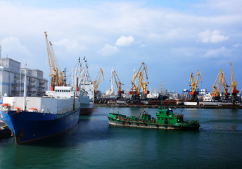Naklejka premium trading port with cranes and cargo ships