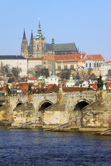 The late Snow in Prague - gothic Castle above the River Vltava