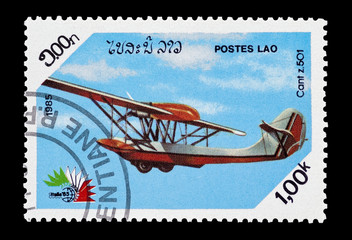 mail stamp printed in Laos featuring a Cant seaplane