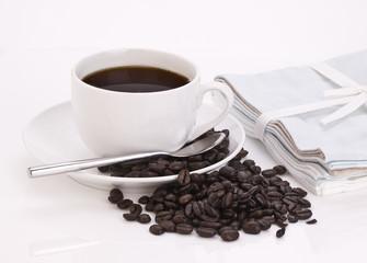 Coffee Cup with spoon and Coffee beans