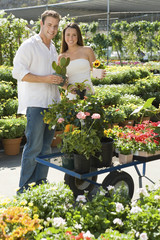 Young Couple Shopping Together at Garden Nursery