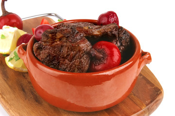 beef meat in pot with vegetables