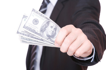 businessman holds money in a hand