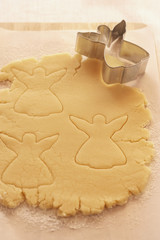 christmas cookie dough with shape cutter