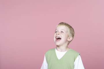 young boy wearing vest shouting © MDBPIXS