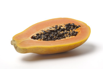 Half papaya on white background