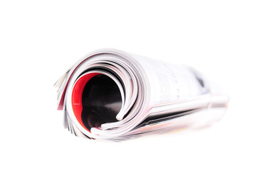Rolled up newspaper