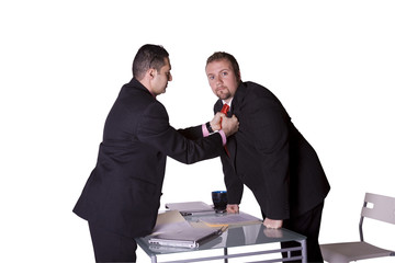 Businessmen Fighting Across the Desk