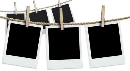 two rows of hanging polaroids