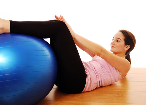 Woman Using Exercise Ball For Fitness