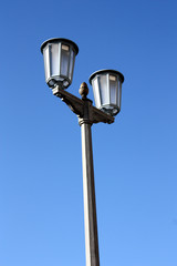 Fototapeta na wymiar Berlin, lampy uliczne w Karl-Marx-Allee