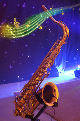 Saxophone with note signs.