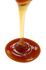 Honey leaking on ground isolated on white background