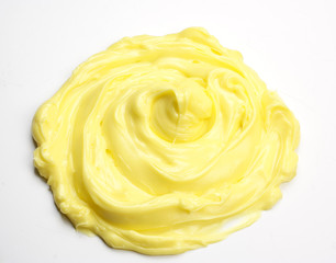 Sweet lemon mass on white background