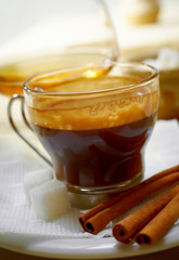 Close-up of a wonderful cup of hot coffee and cognac