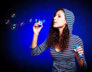 pretty girl with soap bubbles