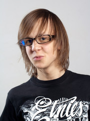 Cool young fashion man in glasses