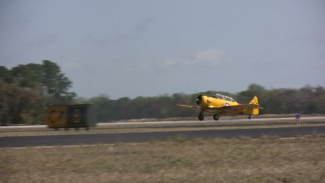Old yewllow airplane taxiing