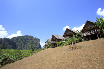Cottage style resort in bright blue sky, Thailand