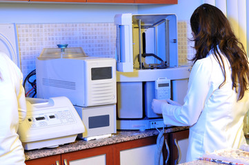 A pathology laboratory assistant working