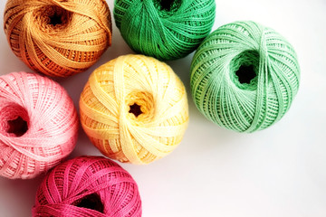 Bright multi-coloured hanks of threads