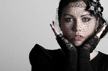 Fashionable Teenager in Veil and Lace Gloves