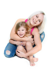 happy mother and daughter over white
