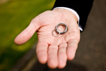 wedding rings in best man hand