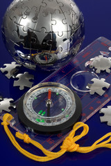 Globe puzzle with compass