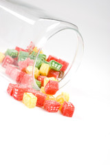 delicious sweet candies in sugar in a glass jar