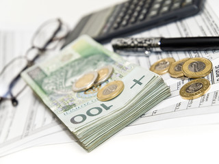 Tax calculation. Shallow DOF. Focus on 100.