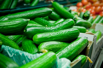 Picture of fresh cucumber, tomatoes and other vegetables in supe