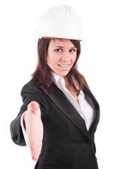 Young engineer, offering handshake