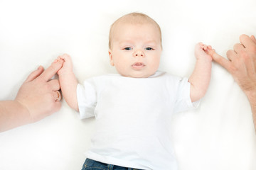happy family - baby on the bed