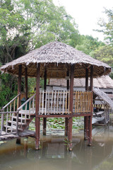 a rest house at the lake or water