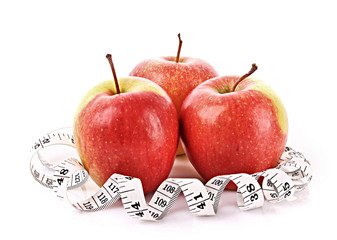 Apples and a measure tape, diet concept