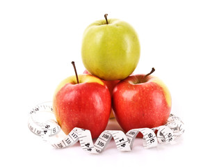 Apples and a measure tape, diet concept