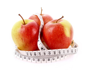 Apples and a measure tape, diet concept