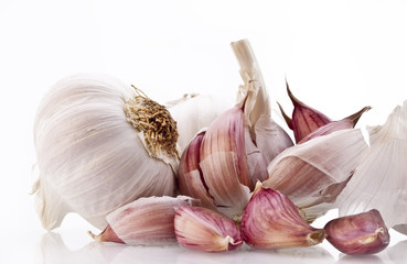 Garlic bulbs on white background